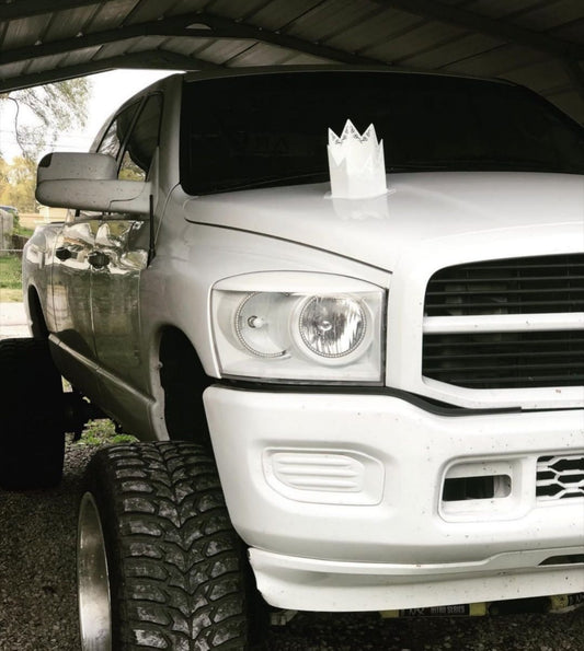 Custom spiked Hood Stack tip white with swirl cutouts installed on the truck