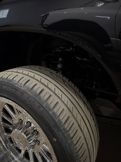 2nd gen, 3rd gen, 4th gen Shock Tower Delete Plates (1994 - 2012 Dodge 2500/3500) installed side view powder coated black with polished overlays 