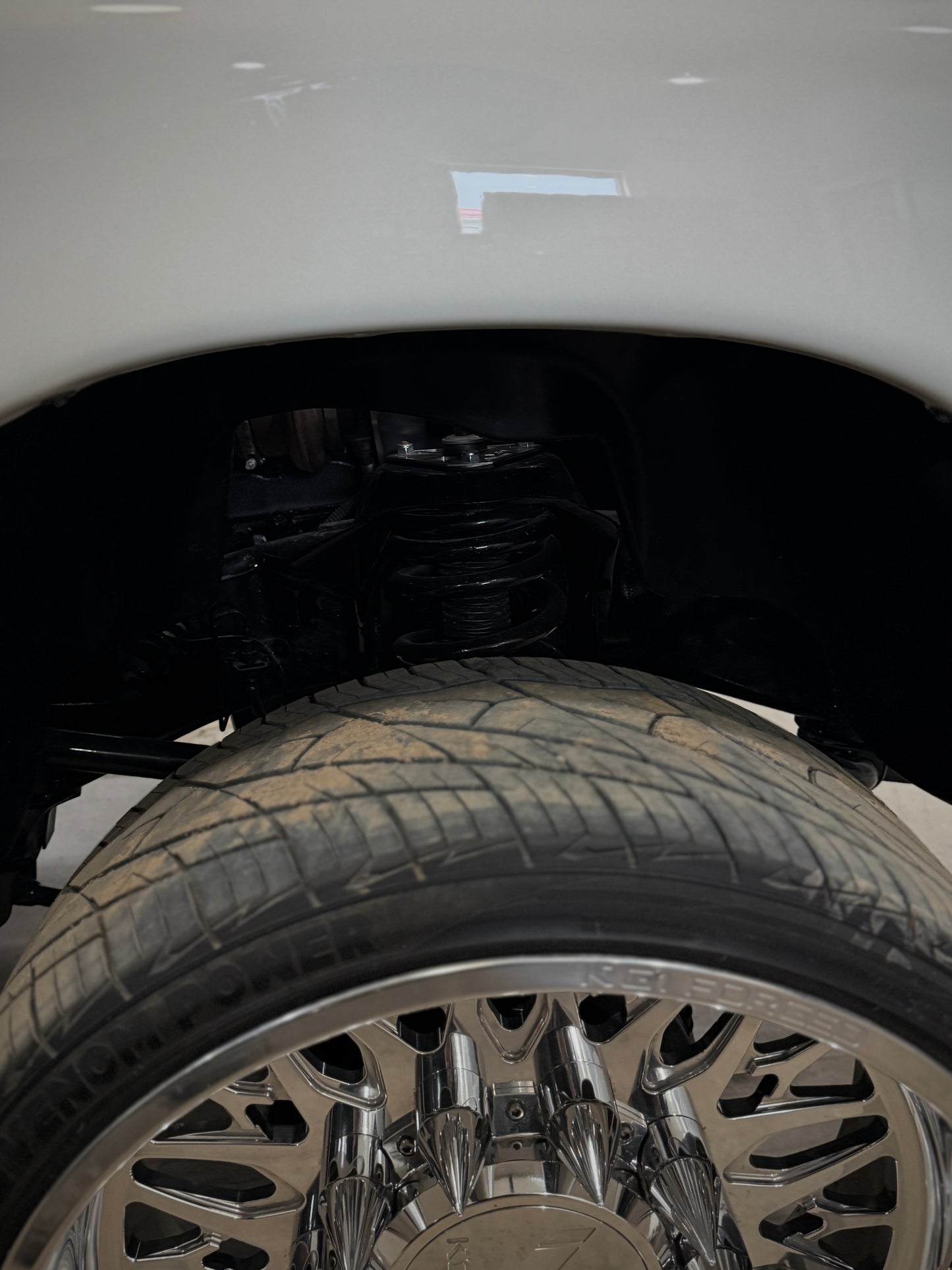 2nd gen, 3rd gen, 4th gen Shock Tower Delete Plates (1994 - 2012 Dodge 2500/3500) installed side view powder coated black with polished overlays 