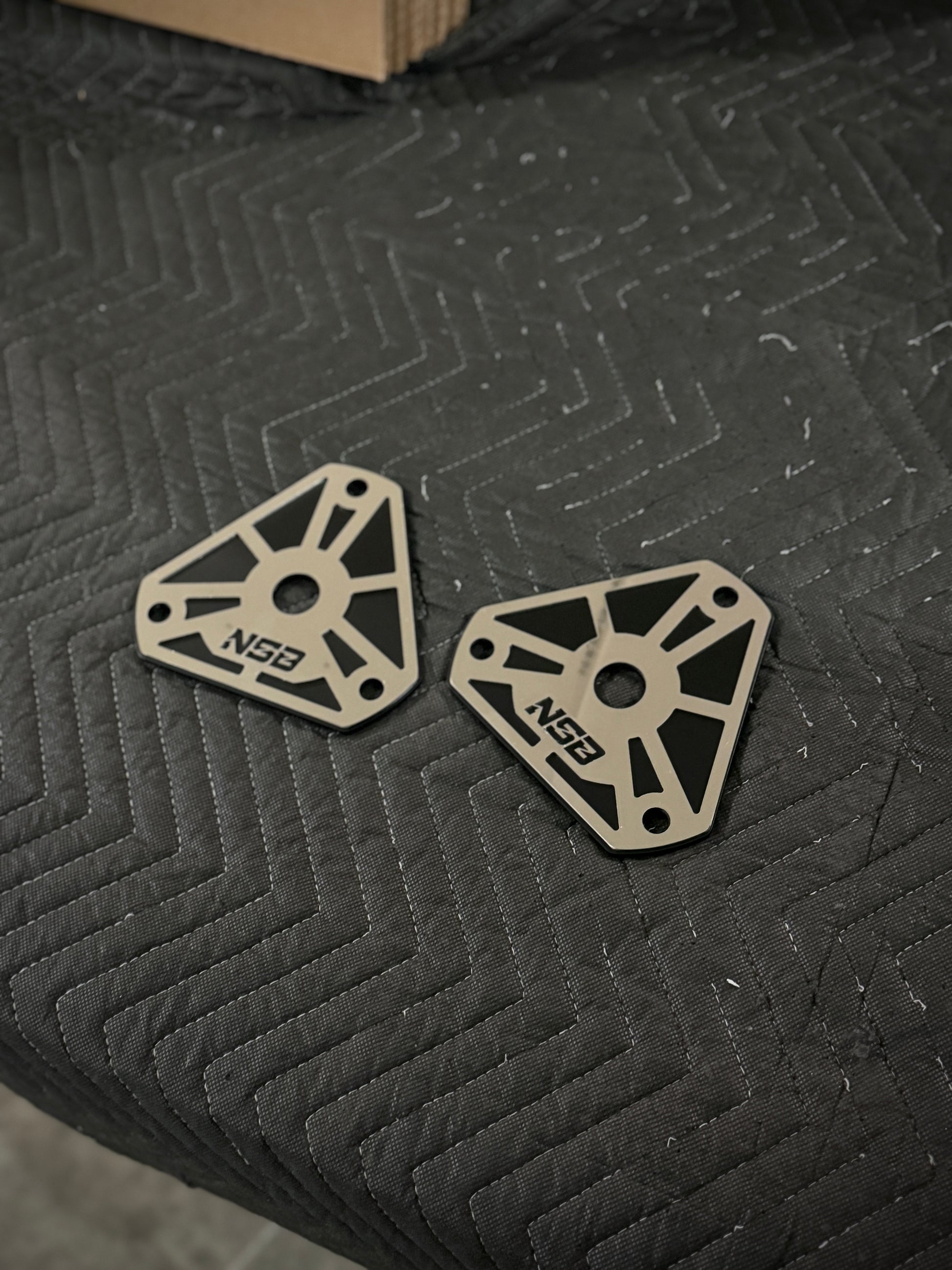 2nd gen, 3rd gen, 4th gen Shock Tower Delete Plates (1994 - 2012 Dodge 2500/3500) powder coated black with polished overlays by NSB