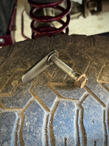 4th gen RAM 1500 Rear Upper Shock Nuts with Tabs Raw steel close up