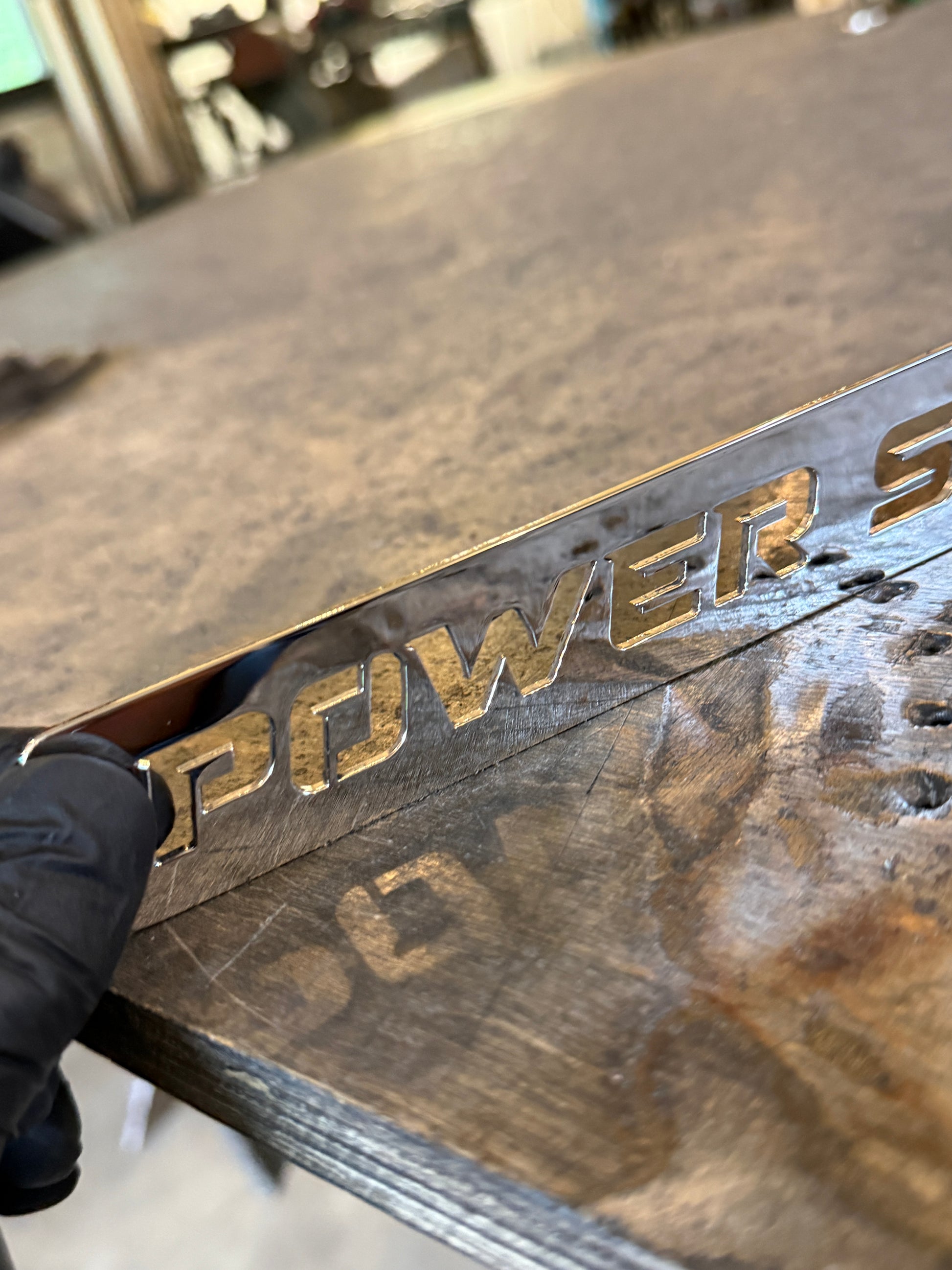 6.0 Power Stroke Fan Shroud Emblem Custom engine bay polished stainless steel close up on polishing quality 