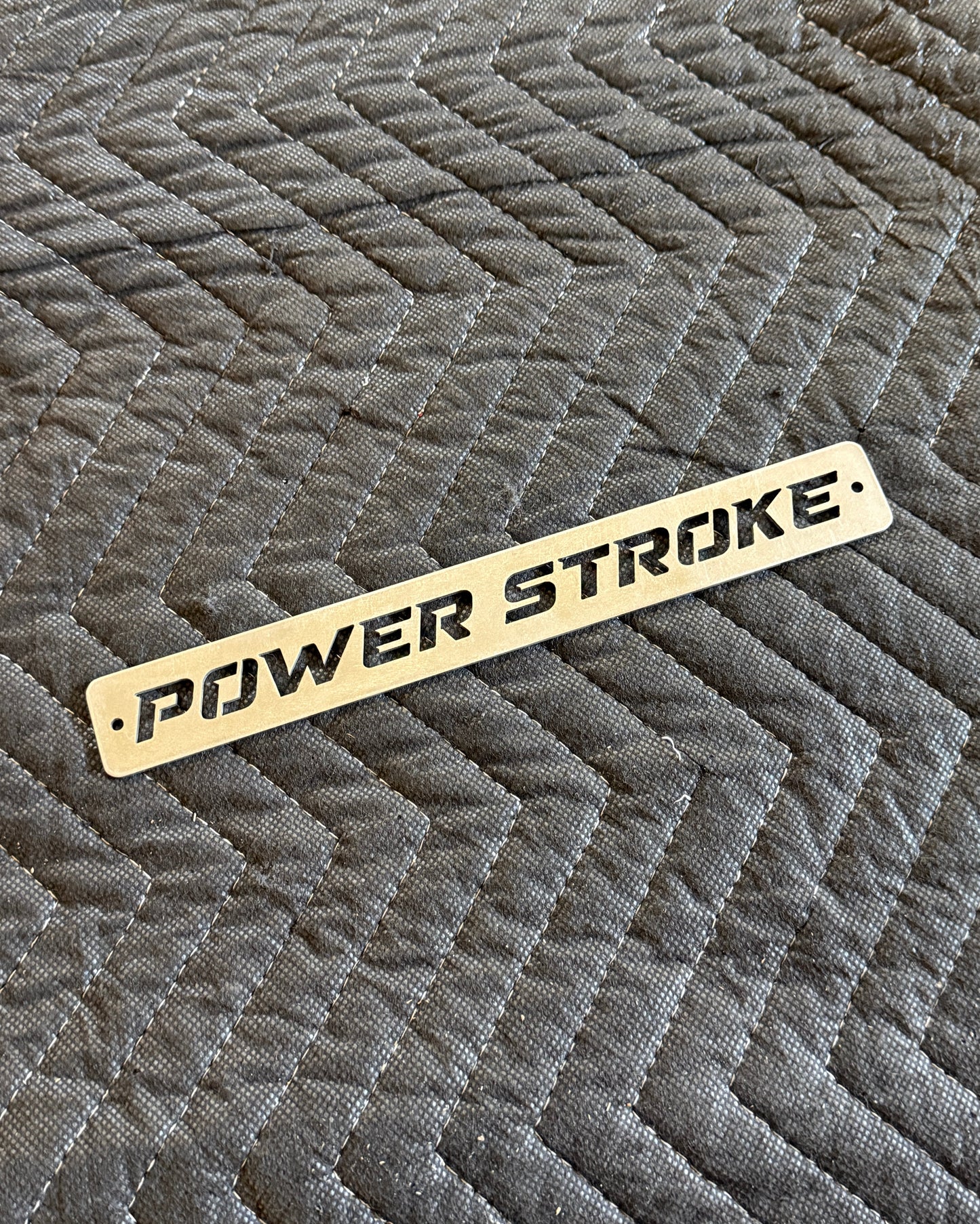 6.0 Power Stroke Fan Shroud Emblem Custom raw stainless steel close up 