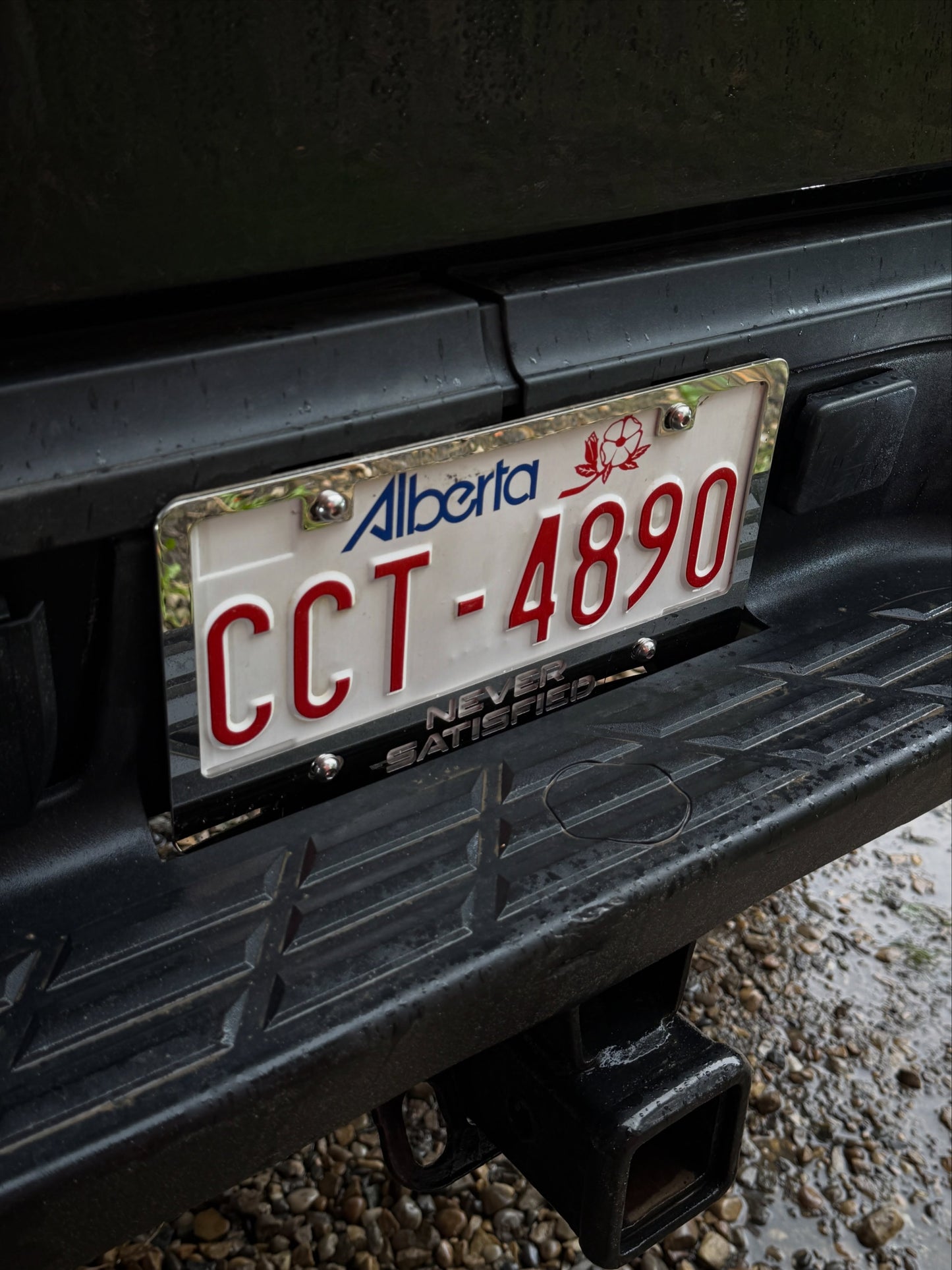 NEVER SATISFIED Stainless License Plate Frame (US & Canada)
