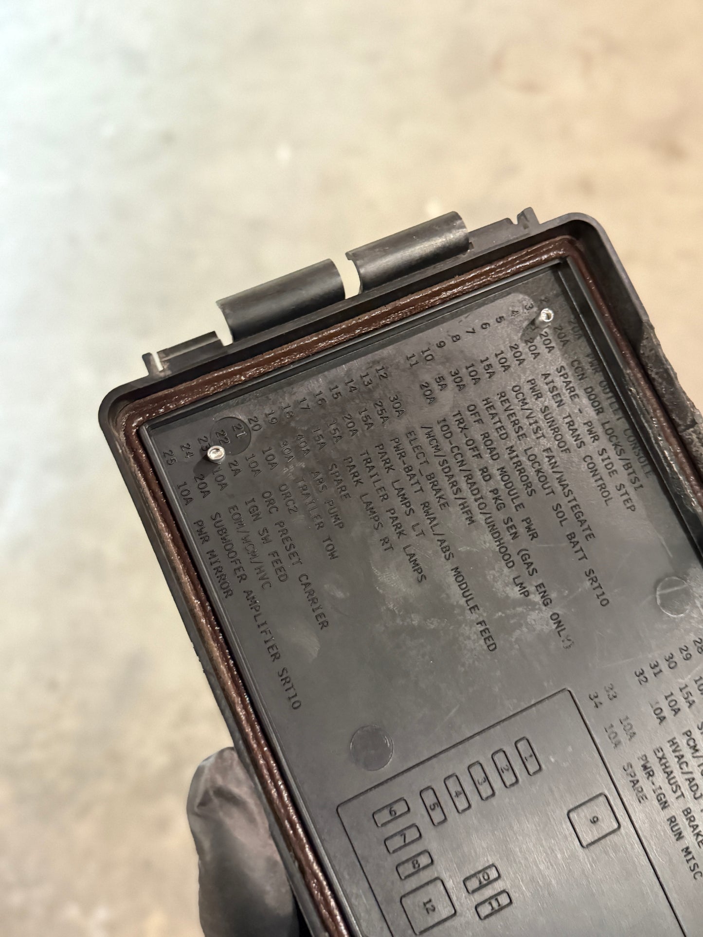 Fuse box cover back side view close up on fuse numbers Dodge Cummins 3rd Gen mounted 