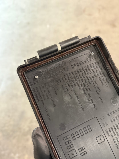 Fuse box cover back side view close up on fuse numbers Dodge Cummins 3rd Gen mounted 