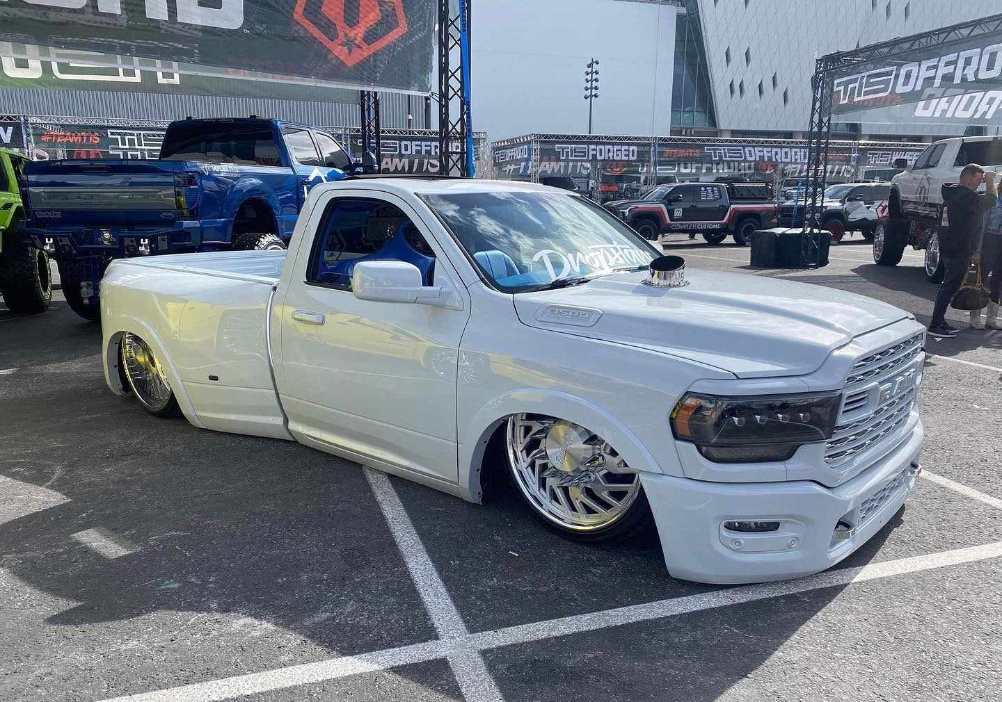 polished stainless steel Hood Stack installed on a lowered ram truck at sema show 