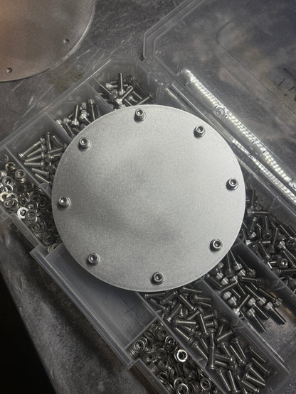 hood stack cover plate close up with hardware Raw stainless steel