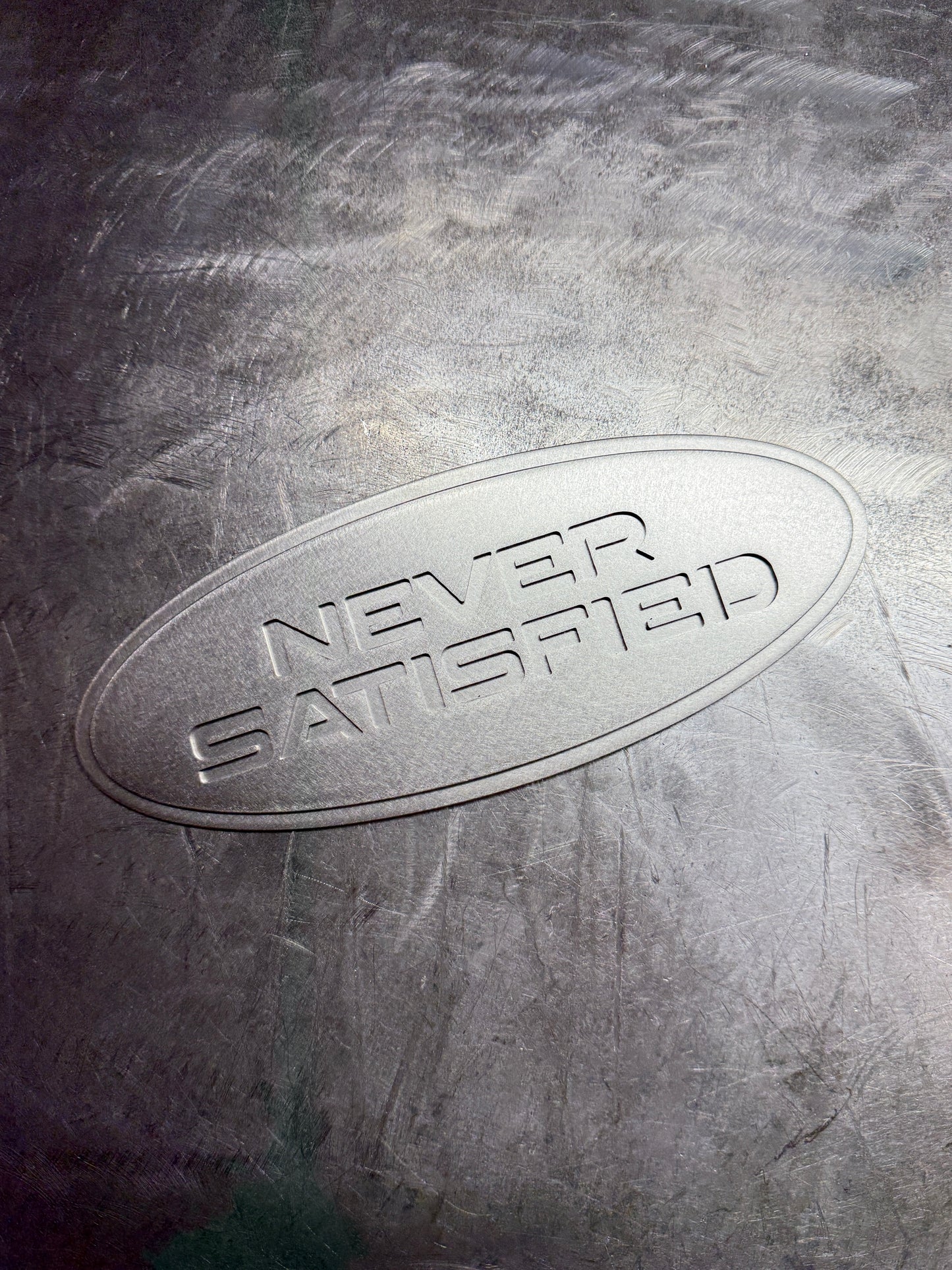 "Never Satisfied" Emblem (Ford 9" Universal Fitment)