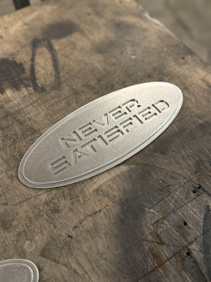 "Never Satisfied" Emblem (Ford 9" Universal Fitment)