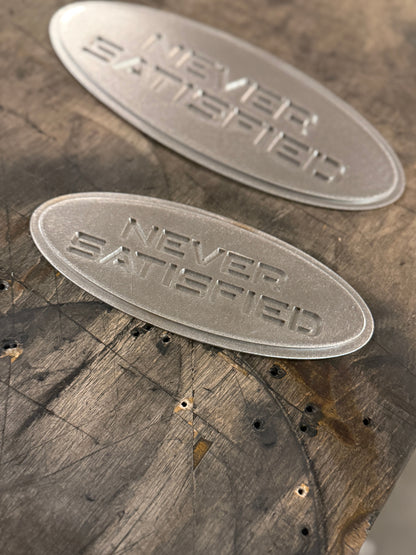 "Never Satisfied" Emblem (Ford 7" Universal Fitment)