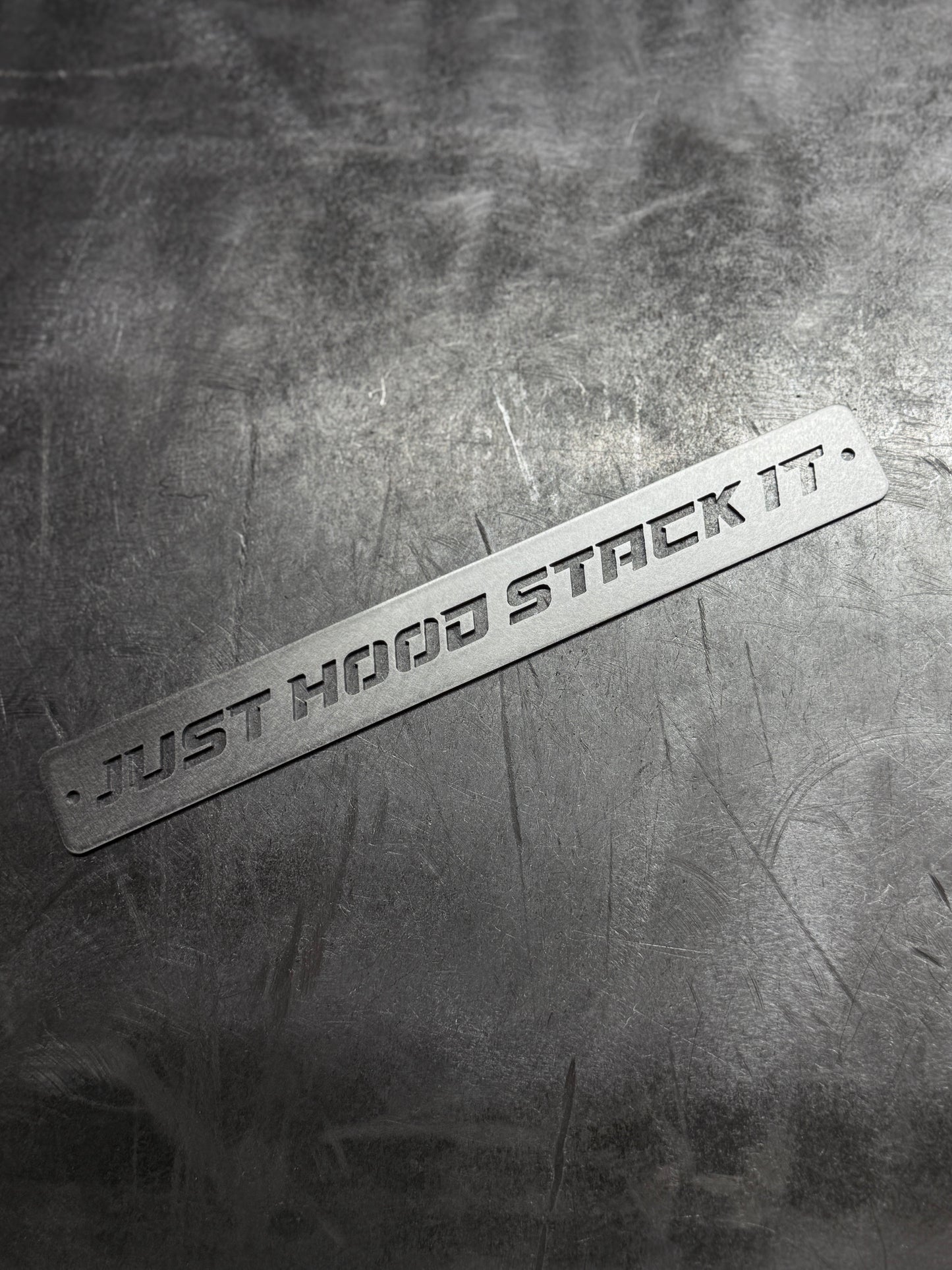6.0 powerstroke fan shroud emblem raw stainless steel close up view