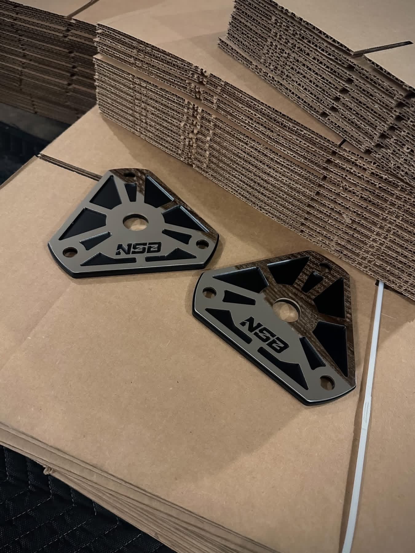 Low profile Shock mounts (1994 - 2012 Dodge 2500/3500) zoomed in view with polished NSB overlays 