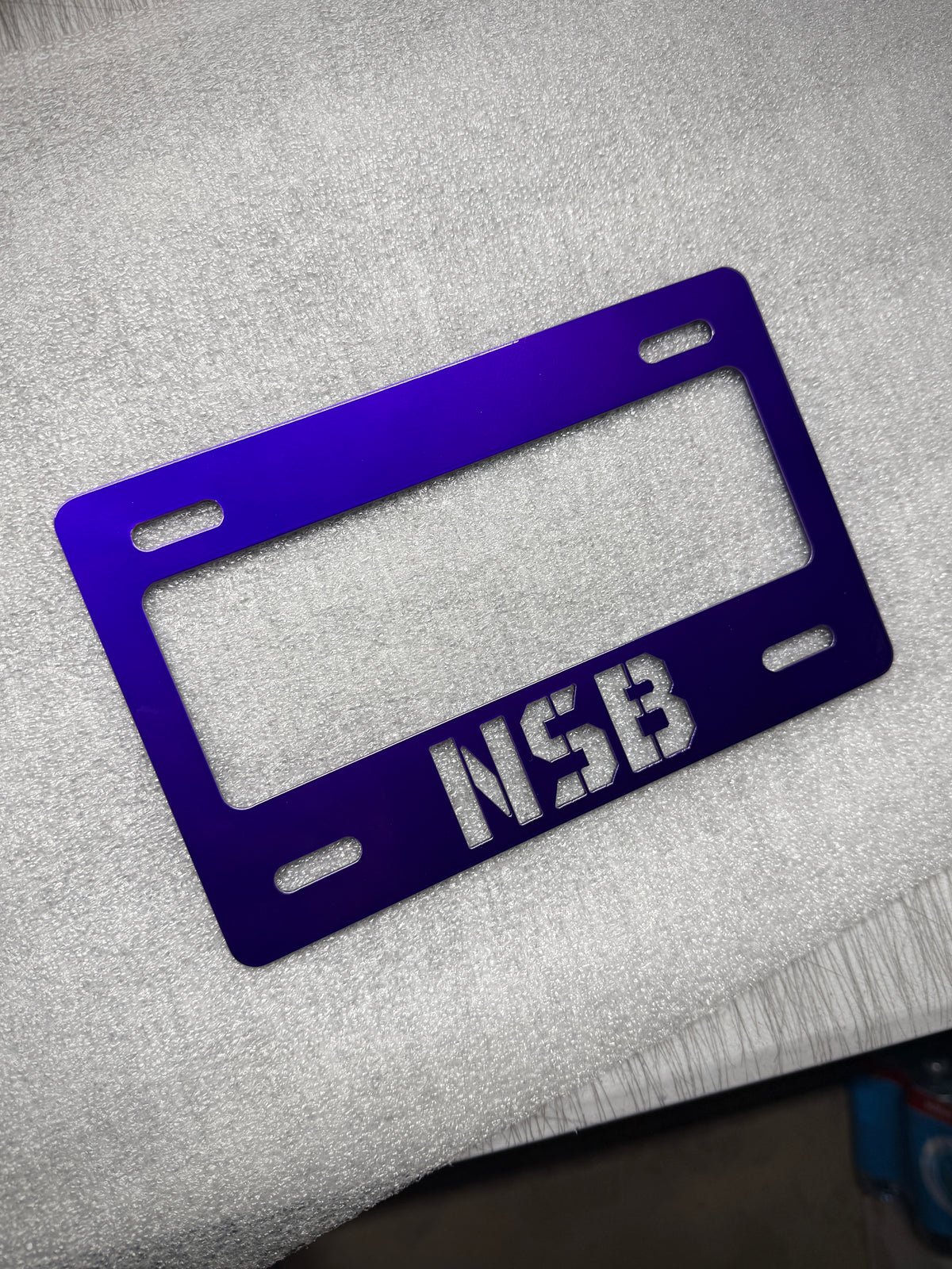 NSB OHV Stainless License Plate Frame powder coated purple close up