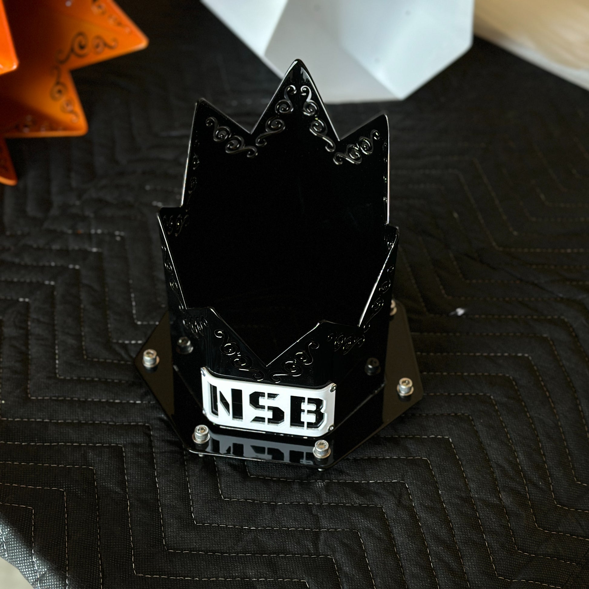 NSB SPIKED DESIGNER Hood Stack top view close up with white emblem gloss black powder coat with hardware