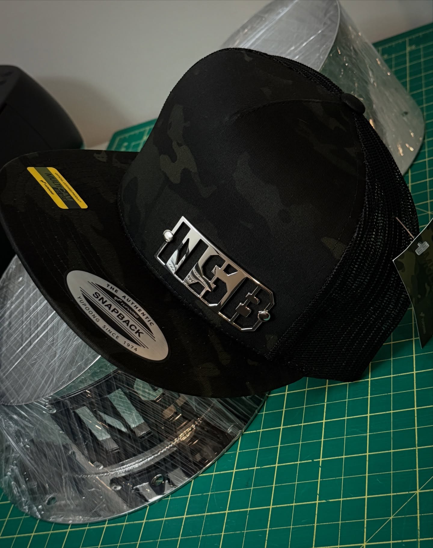 Northspec Built Camo Snapback hat with polished emblem