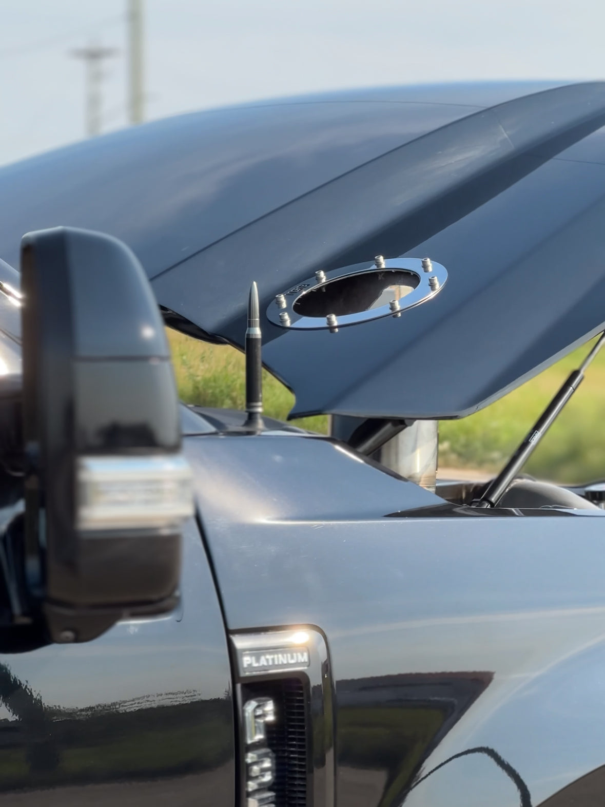 Exhaust Trim Rings installed on the hood exit with socket cap bolts