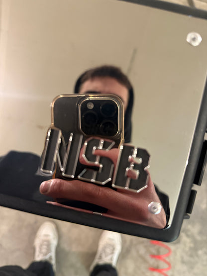 Polished NSB logo close up on a 3rd gen Cummins fuse box cover overlay 