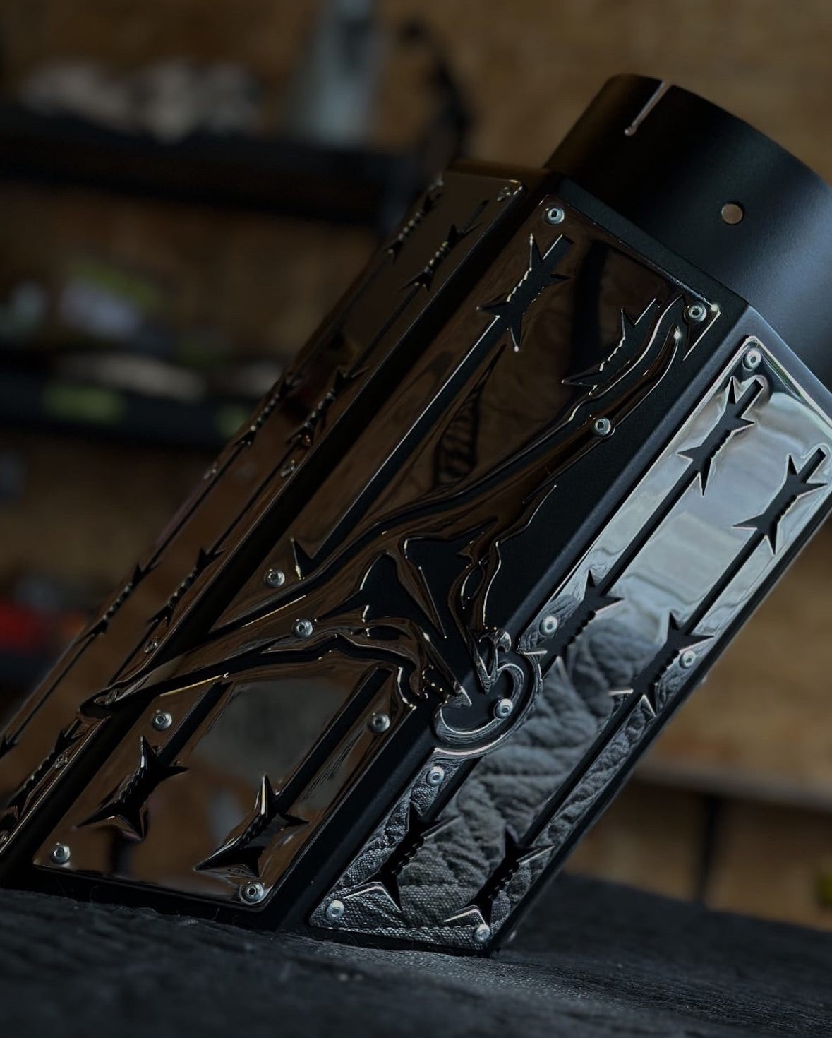 NSB custom longhorn barbed wire overlay exhaust tip close up