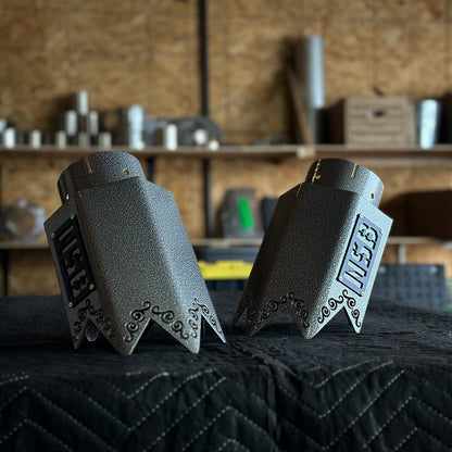 exhaust tip duo with spiked ends and swirls silver artery prismatic powder coat