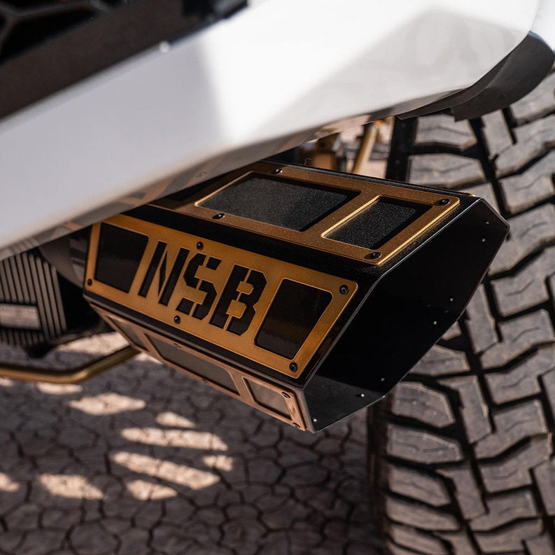 7 inch OVERLAY Exhaust Tip mounted on a lifted truck detailed close up view of the overlays by NSB