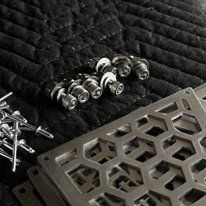hexagon honeycomb stainless steel overlays hood stack hardware close up view 