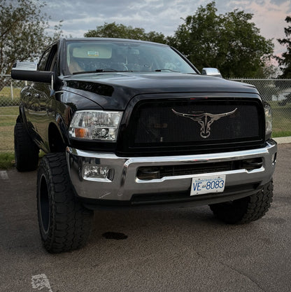 longhorn bull aftermarket grille emblems mounted on the truck 