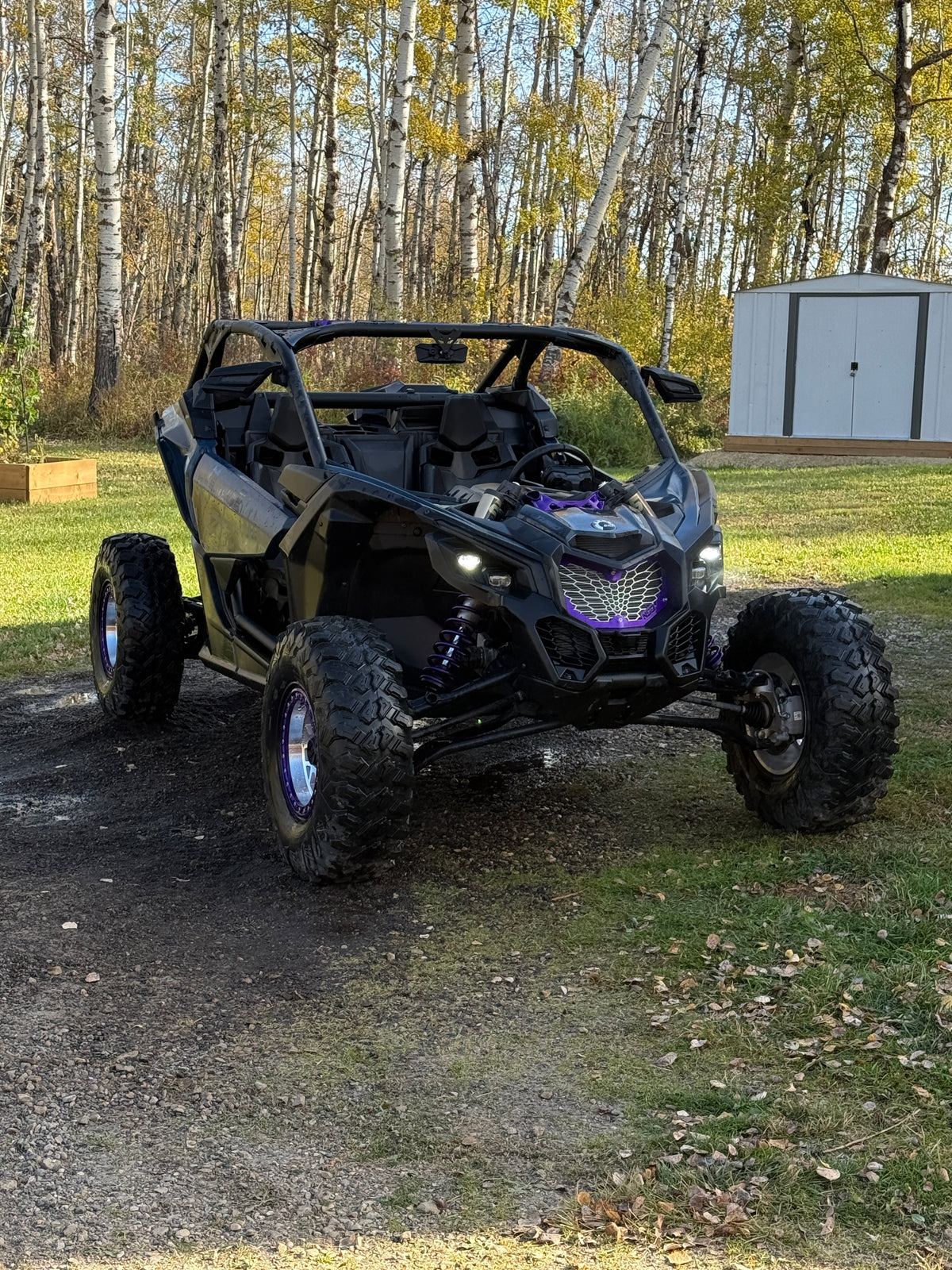 custom 64" canam x3 turbo with 4+3 wheels and 2" wheel spacers sitting wide