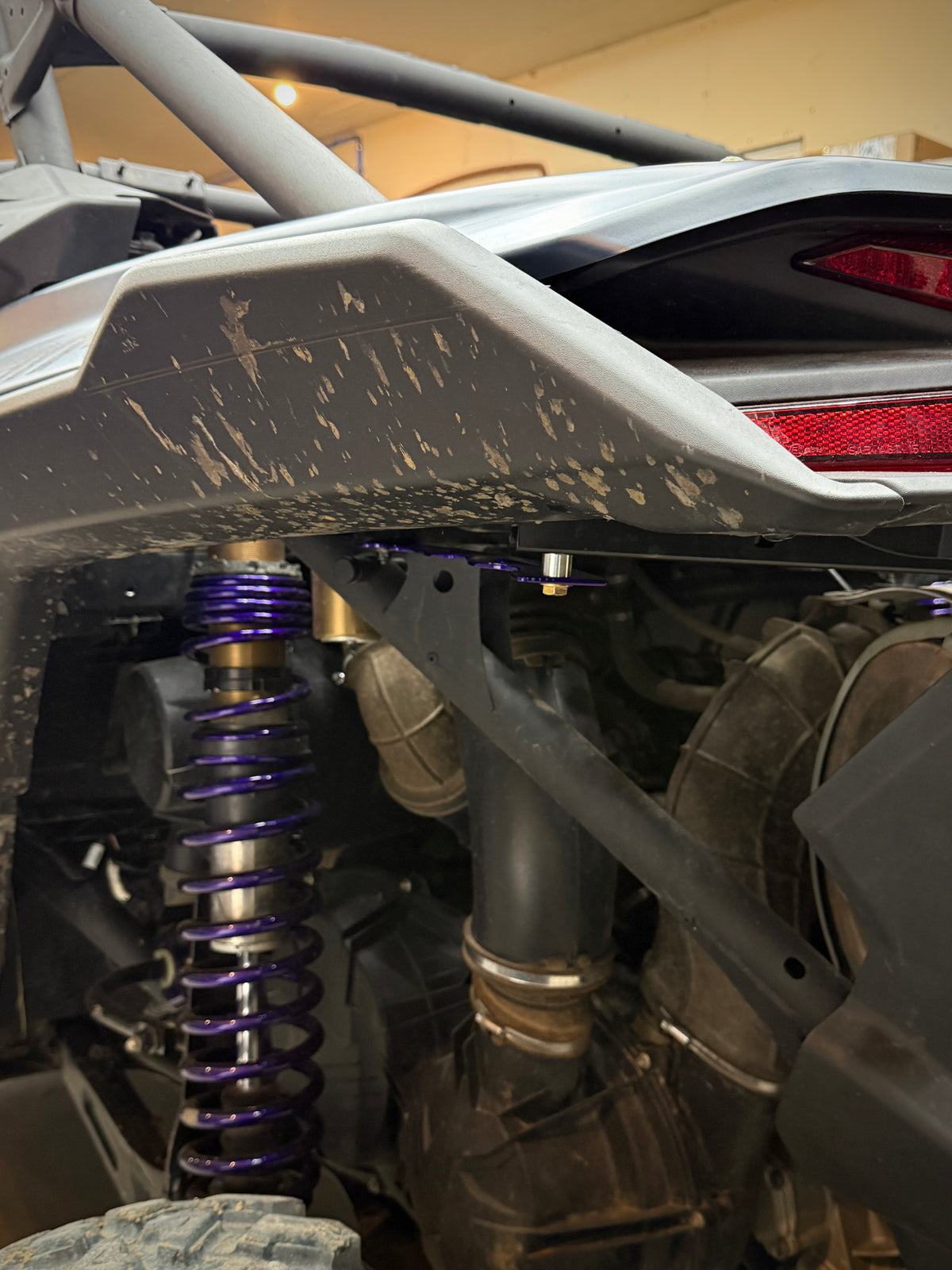 side view Can-Am Maverick X3 Bed Supports for ratchet straps or cooler tie down